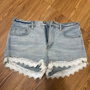 Free People Light Wash Denim Shorts with Lace Trim